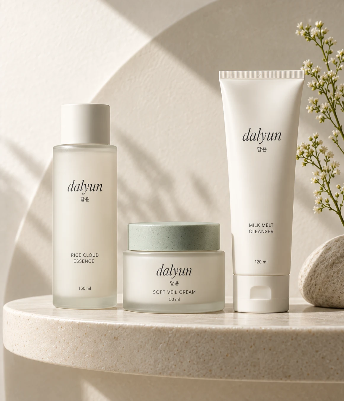 Three DALYUN daily essentials on an ivory ceramic shelf